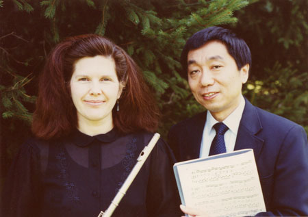 Margaret and Sam posed with flute and music